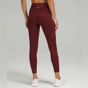 Lululemon Wunder Train High-Rise Tight 25"
Sun Bleached Wash Red Merlot size 2